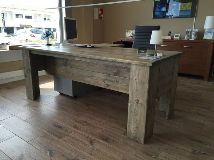 This desk is homemade of scaffoldingwood for a client and painted in grey. The price depends on the sizes.